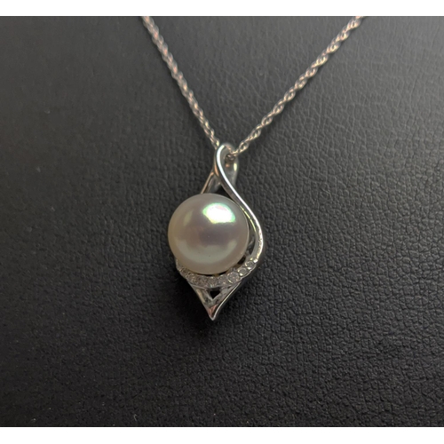 53 - A 9CT WHITE GOLD AND PEARL AND DIAMOND PENDANT NECKLACE, with a single row of diamonds below the pea... 