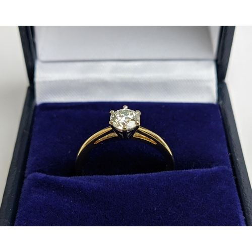 54 - AN 18CT GOLD DIAMOND SOLITAIRE RING, the claw set round brilliant cut stone of approximate diamond w... 