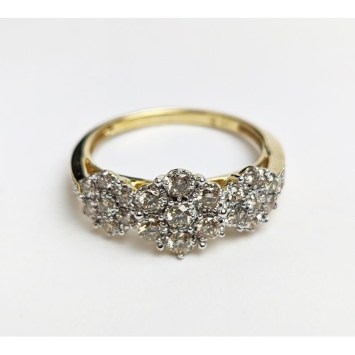 55 - A 9CT YELLOW GOLD DIAMOND CLUSTER DRESS RING, set with three clusters of seven diamonds, total diamo... 