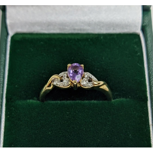 60 - A 9CT YELLOW GOLD AMETHYST AND DIAMOND DRESS RING, the pear cut amethyst stone of 0.45 carats, diamo... 