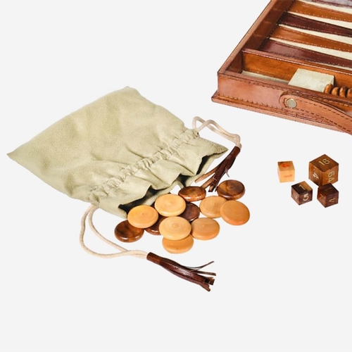 617 - BACKGAMMON SET, in leathered case, 7cm x 23cm x 40cm.