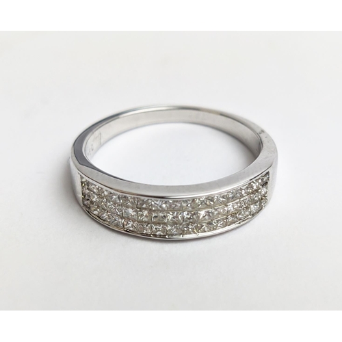 62 - AN 18CT WHITE GOLD DIAMOND RING, with 45 invisible set princess cut diamonds in three rows, total di... 