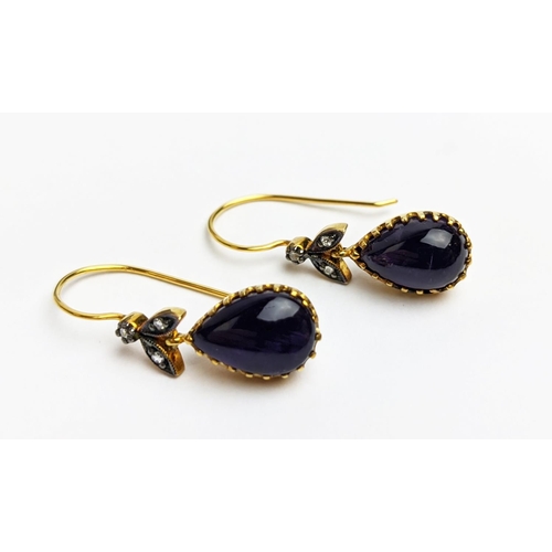 63 - A PAIR OF 9CT GOLD AMETHYST AND DIAMOND DROP EARRINGS, each with a pear shaped amethyst cabochon in ... 