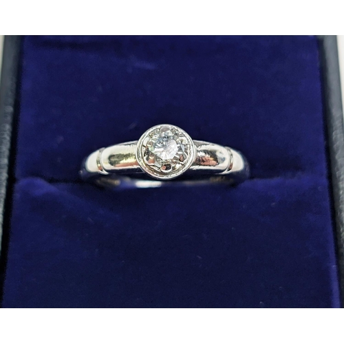 67 - A 9CT WHITE GOLD DIAMOND SOLITAIRE RING, the diamond of approx. 0.25 carat, ring size L, complete wi... 