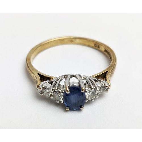 68 - A 9CT YELLOW GOLD SAPPHIRE AND DIAMOND FIVE STONE RING, the central sapphire of 0.50 carat, the diam... 