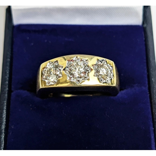 69 - A 9CT YELLOW GOLD GENTS THREE STONE DIAMOND RING, each in a star setting, total diamond weight of 1.... 