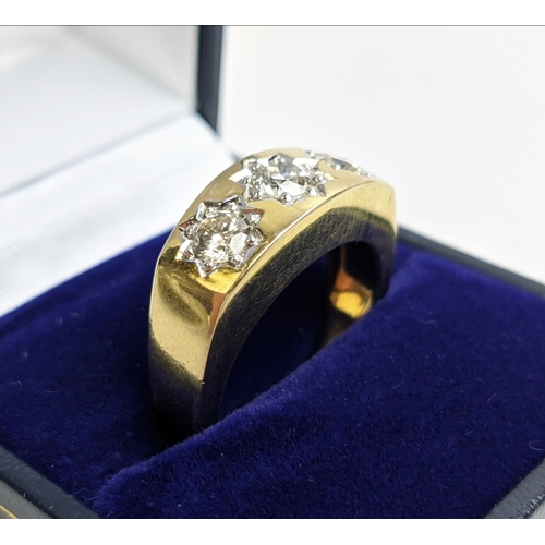 69 - A 9CT YELLOW GOLD GENTS THREE STONE DIAMOND RING, each in a star setting, total diamond weight of 1.... 