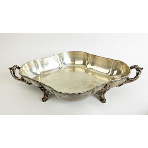 70 - A PAIR OF SILVER PLATED TUREENS AND COVERS, in the Rococo style, plus a pair of warming dishes and t... 