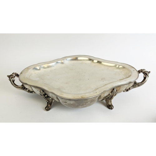 70 - A PAIR OF SILVER PLATED TUREENS AND COVERS, in the Rococo style, plus a pair of warming dishes and t... 