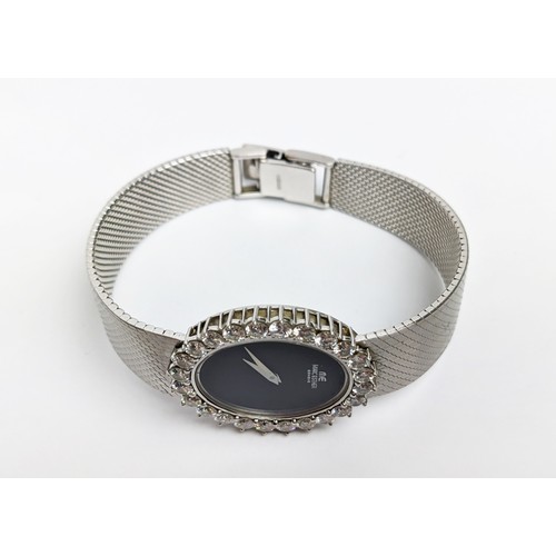 3 - MARC ESTHER OF GENEVE 18CT WHITE GOLD LADIES WRISTWATCH, 1979, the bezel set with 24 round brilliant... 