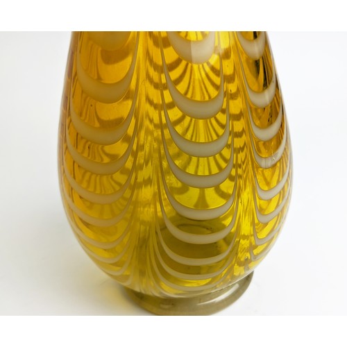 16 - A MURANO AMBER GLASS TALL VASE, late 20th Century, of baluster form, with white feather pattern to b... 