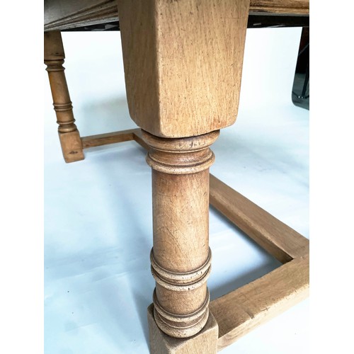 660 - DRAWLEAF REFECTORY TABLE, English refectory style oak extending with two leaves with turned pillar s... 