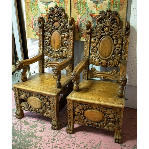 342 - THRONE CHAIRS, a near pair, late 19th century Continental carved oak, tallest 139cm H x 60cm W. (2)