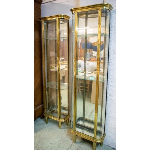 351 - DISPLAY CABINETS, 200cm H x 55cm W x 23cm D, a pair, circa 1900, brass of narrow form, each with gla... 