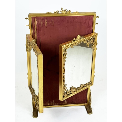 341 - DRESSING MIRROR, late 19th/early 20th century giltwood and metal with triple hinged plates.