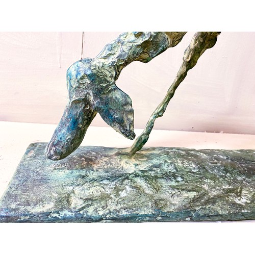 271 - GIACOMETTI STYLE SCULPTURE OF A DOG, bronze with verdigris finish, raised on a plinth base. 59.5cm L... 