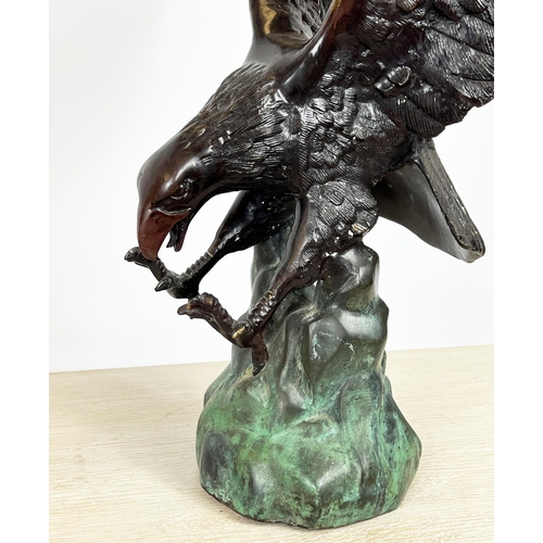 20 - BRONZE EAGLE, cast swooping in flight, 53cm H x 33cm W.