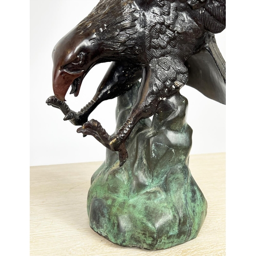 20 - BRONZE EAGLE, cast swooping in flight, 53cm H x 33cm W.