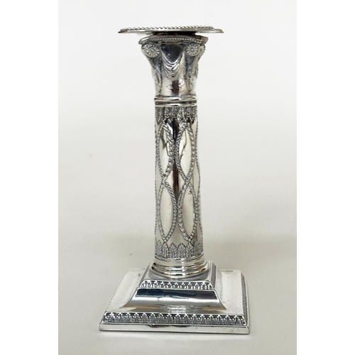 398 - CANDLESTICKS, a pair, George V silver with swag decorated columns and square bases Sheffield 1928 Th... 