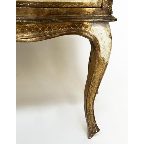 399 - FLORENTINE COMMODE, mid 20th century Italian Florentine serpentine outline cream parcel gilt with tw... 