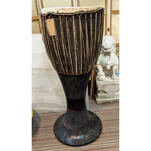 649 - AFRICAN DRUM, 60cm x 147cm H.