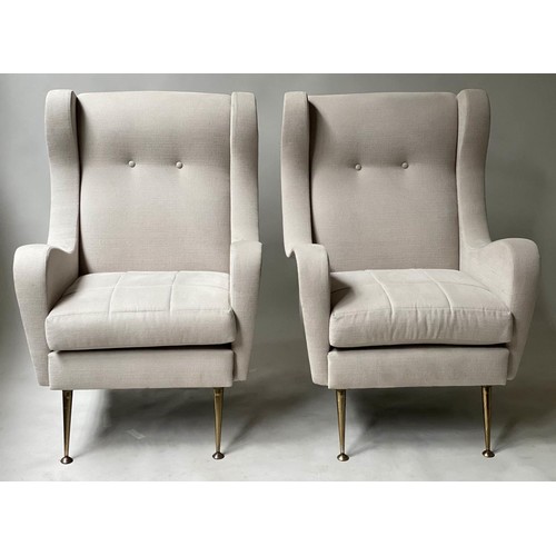 332 - WING ARMCHAIRS, a pair, 1960's style with parchment cotton upholstery and splay gilt metal supports,... 