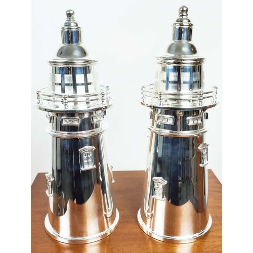 644 - COCKTAIL SHAKERS, a pair, in the form of lighthouses polished metal, 35cm H x each. (2)