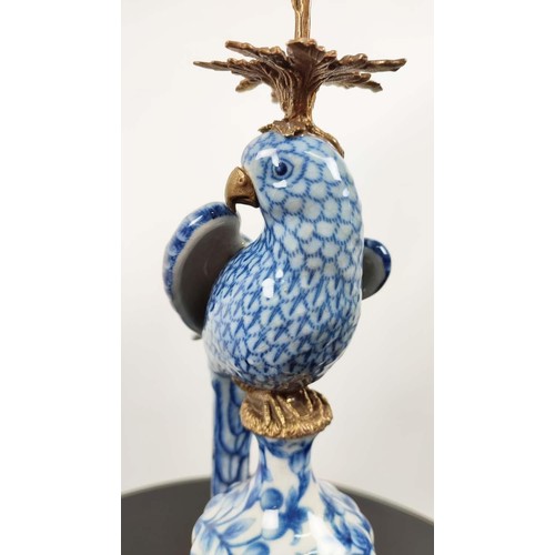 648 - CANDELABRA, 48cm high, a pair, in the form of parrots, blue and white glazed ceramic, gilt mounts. (... 