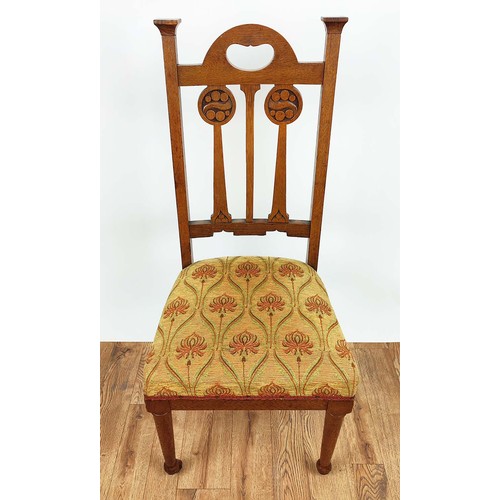 264A - ARTS AND CRAFTS SIDE CHAIRS, a pair, circa 1905 oak the back-splats with carved roundels, overstuffe... 