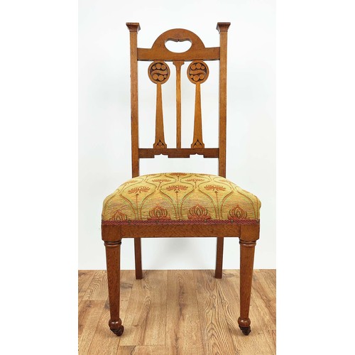 264A - ARTS AND CRAFTS SIDE CHAIRS, a pair, circa 1905 oak the back-splats with carved roundels, overstuffe... 