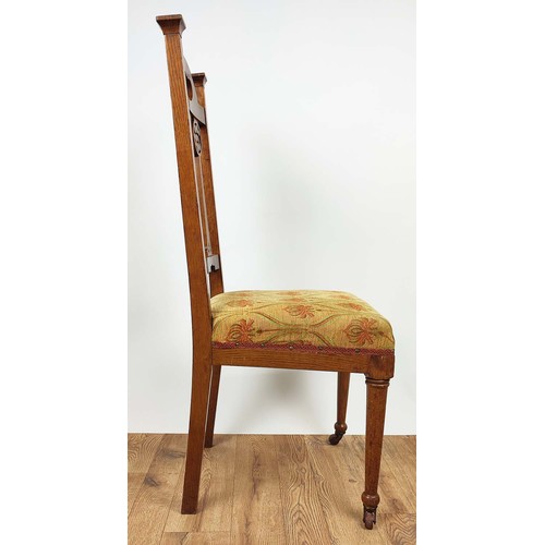 264A - ARTS AND CRAFTS SIDE CHAIRS, a pair, circa 1905 oak the back-splats with carved roundels, overstuffe... 