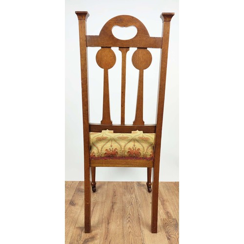 264A - ARTS AND CRAFTS SIDE CHAIRS, a pair, circa 1905 oak the back-splats with carved roundels, overstuffe... 