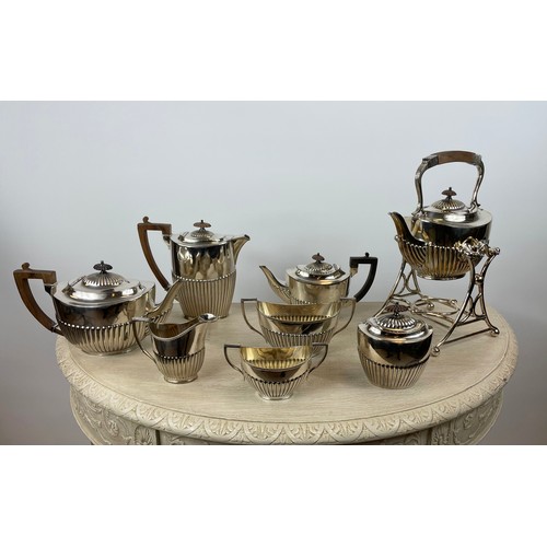 34 - HJ LINTON, PARIS SILVER PLATED TEA AND COFFEE SERVICE, comprising three tea pots one on stand a coff... 