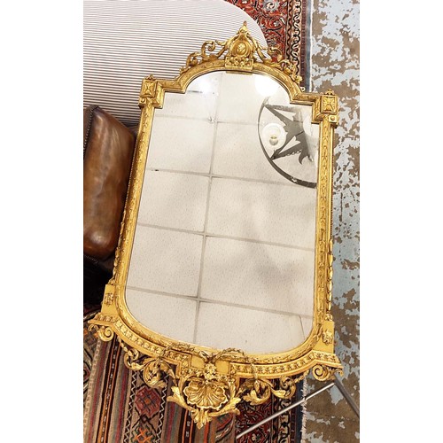 641 - WALL MIRROR, 153cm H x 89cm W, 19th century French giltwood and gesso, circa 1870, with shaped old p... 