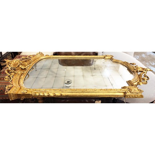 641 - WALL MIRROR, 153cm H x 89cm W, 19th century French giltwood and gesso, circa 1870, with shaped old p... 