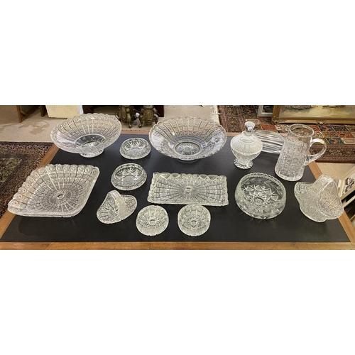 24 - A COLLECTION OF CUT CRYSTAL GLASS, including a water pitcher lidded bowl, baskets, trays, etc. (Qty)