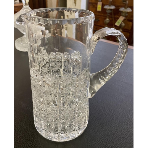 24 - A COLLECTION OF CUT CRYSTAL GLASS, including a water pitcher lidded bowl, baskets, trays, etc. (Qty)