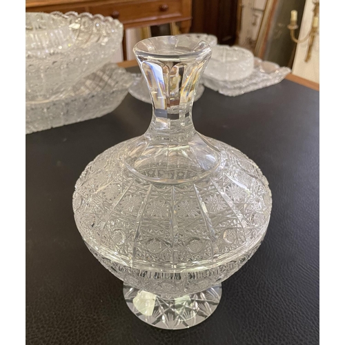 24 - A COLLECTION OF CUT CRYSTAL GLASS, including a water pitcher lidded bowl, baskets, trays, etc. (Qty)