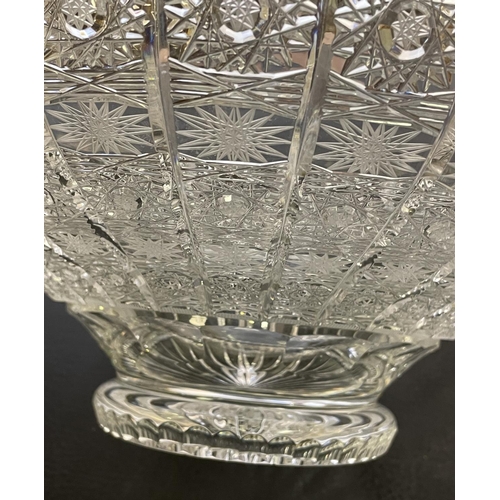 24 - A COLLECTION OF CUT CRYSTAL GLASS, including a water pitcher lidded bowl, baskets, trays, etc. (Qty)