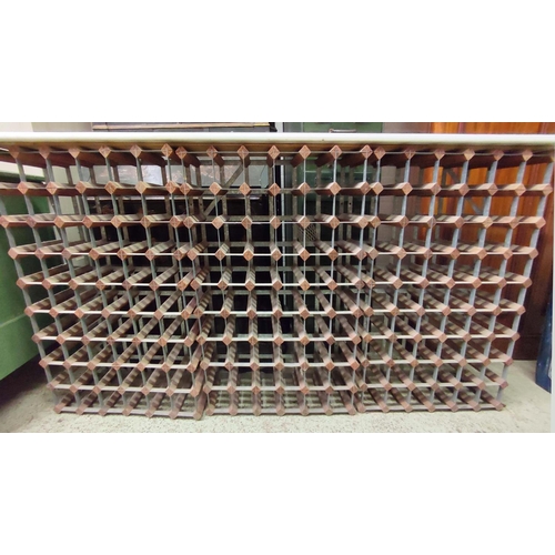 183 - WINE RACK, 189cm x 24cm x 95cm H, with associated white marble top on three metal racks.