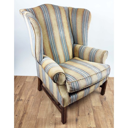 195 - A GEORGE III STYLE WING BACK ARMCHAIR, hand made by Hart Villa Interiors, striped fabric upholstery,... 