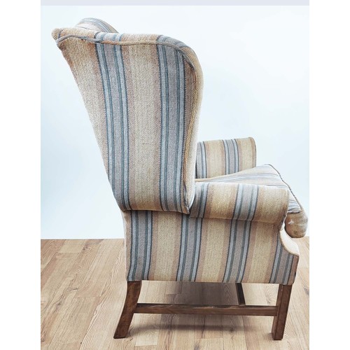 195 - A GEORGE III STYLE WING BACK ARMCHAIR, hand made by Hart Villa Interiors, striped fabric upholstery,... 