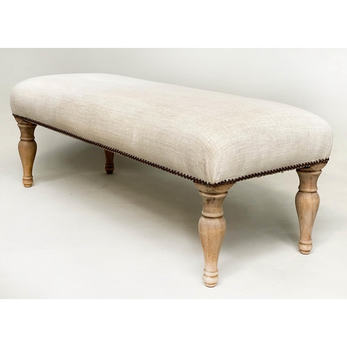 219 - STOOL, rectangular brass studded linen upholstered with turned supports, 108cm W x 40cm H x 44cm D.