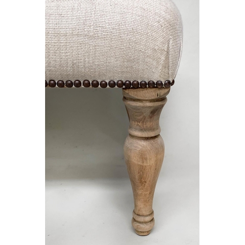 219 - STOOL, rectangular brass studded linen upholstered with turned supports, 108cm W x 40cm H x 44cm D.