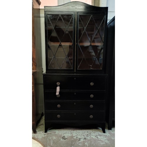 330A - EARLY 19TH CENTURY EBONISED SECRETAIRE BOOKCASE, blazed doors to upper section, the secretaire enclo... 