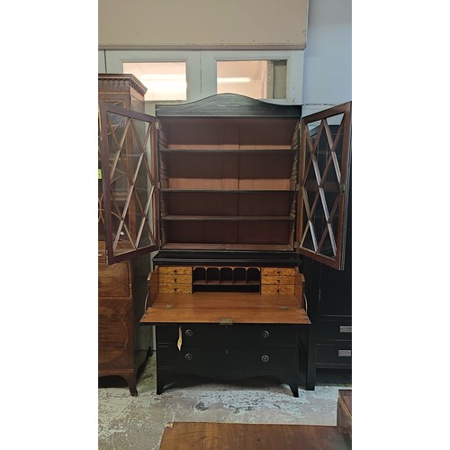 330A - EARLY 19TH CENTURY EBONISED SECRETAIRE BOOKCASE, blazed doors to upper section, the secretaire enclo... 