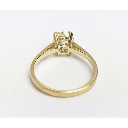 30 - A DIAMOND SOLITAIRE RING, the old mine cut stone of approximately 1.50 carat, yellow metal shank, cl... 