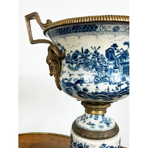 19 - JARDINIERES, a pair, 18th century style Chinese export, blue and white porcelain and gilt metal moun... 