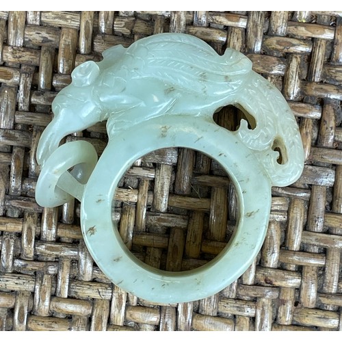 27A - JADE ARCHERS RING, with carved mythical beast.