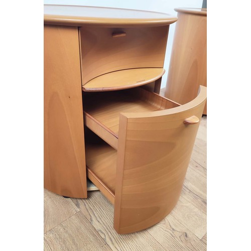 409 - SIDE CABINETS, pair, of cylindrical form, each with a drawer, brushing slide and cupboard door below... 